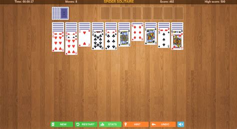 spider solitaire with wood background.